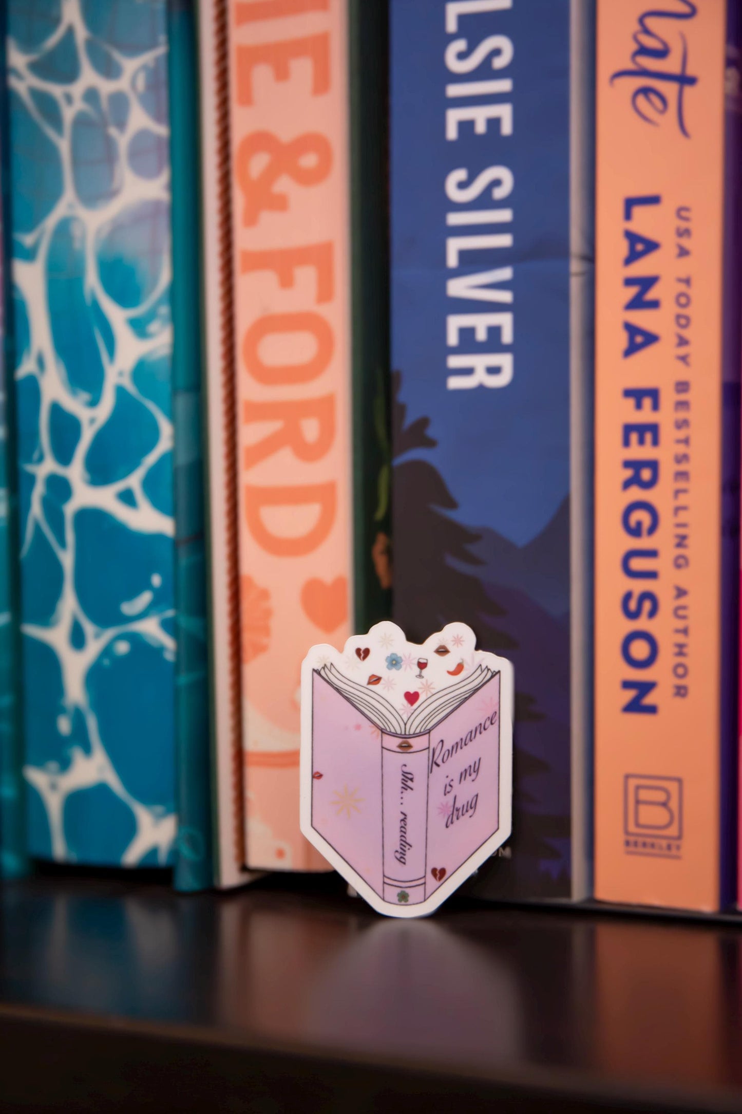 "Romance is my drug" genre sticker
