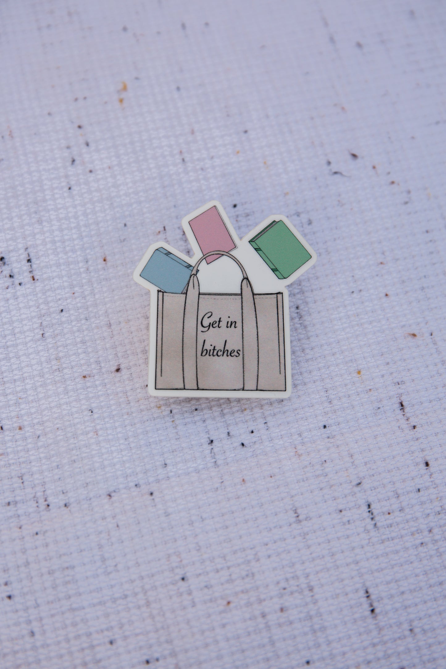 "Get in b**" tote with books vinyl sticker