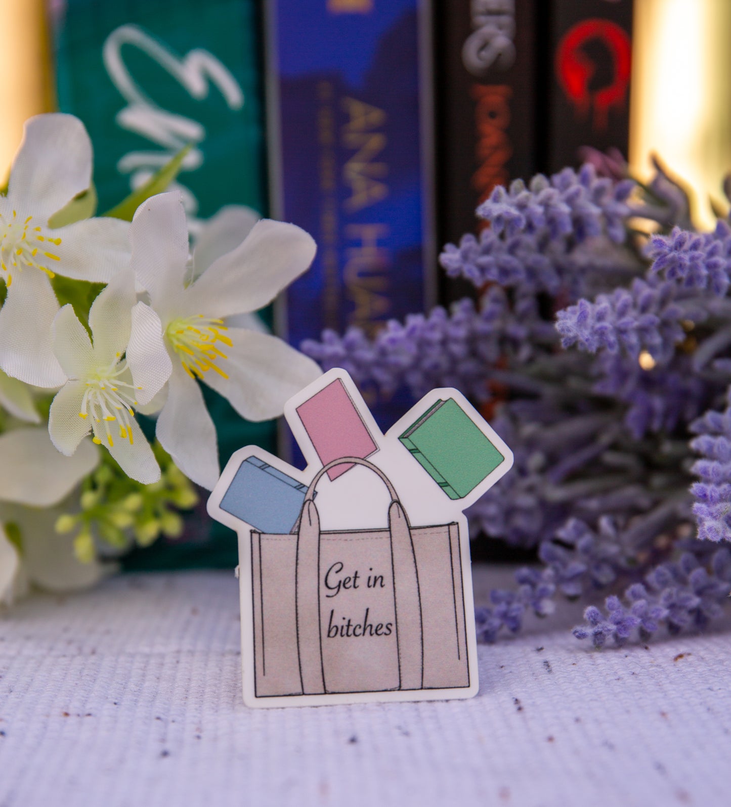 "Get in b**" tote with books vinyl sticker