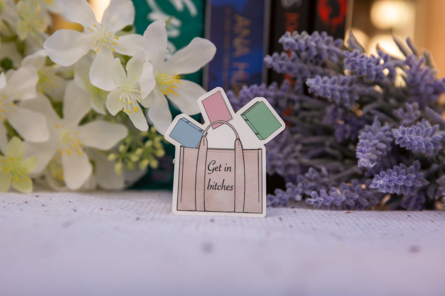 "Get in b**" tote with books vinyl sticker