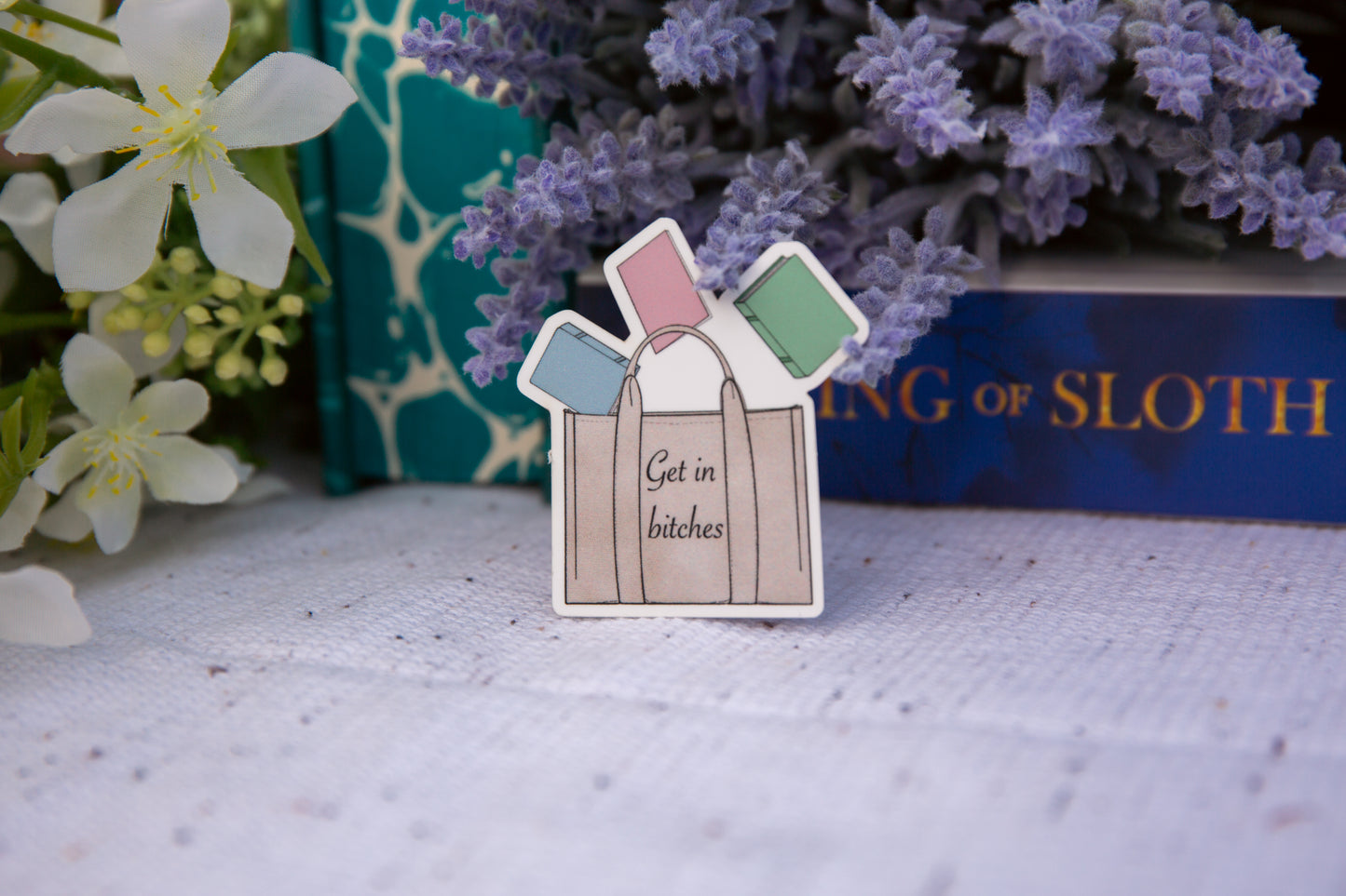 "Get in b**" tote with books vinyl sticker