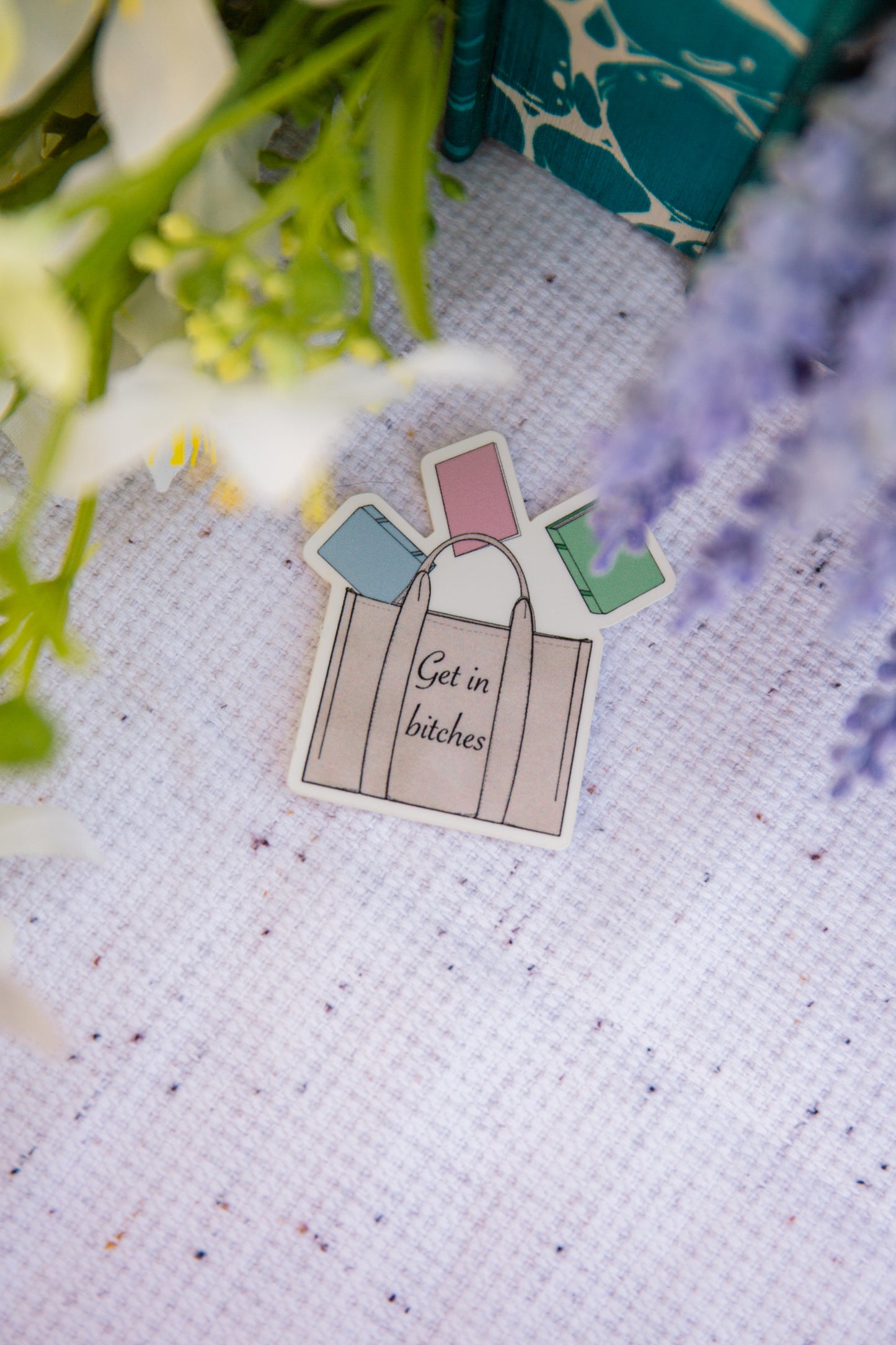 "Get in b**" tote with books vinyl sticker