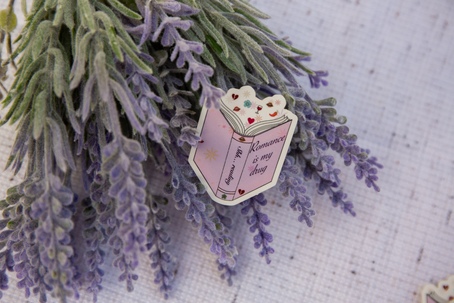 "Romance is my drug" genre sticker