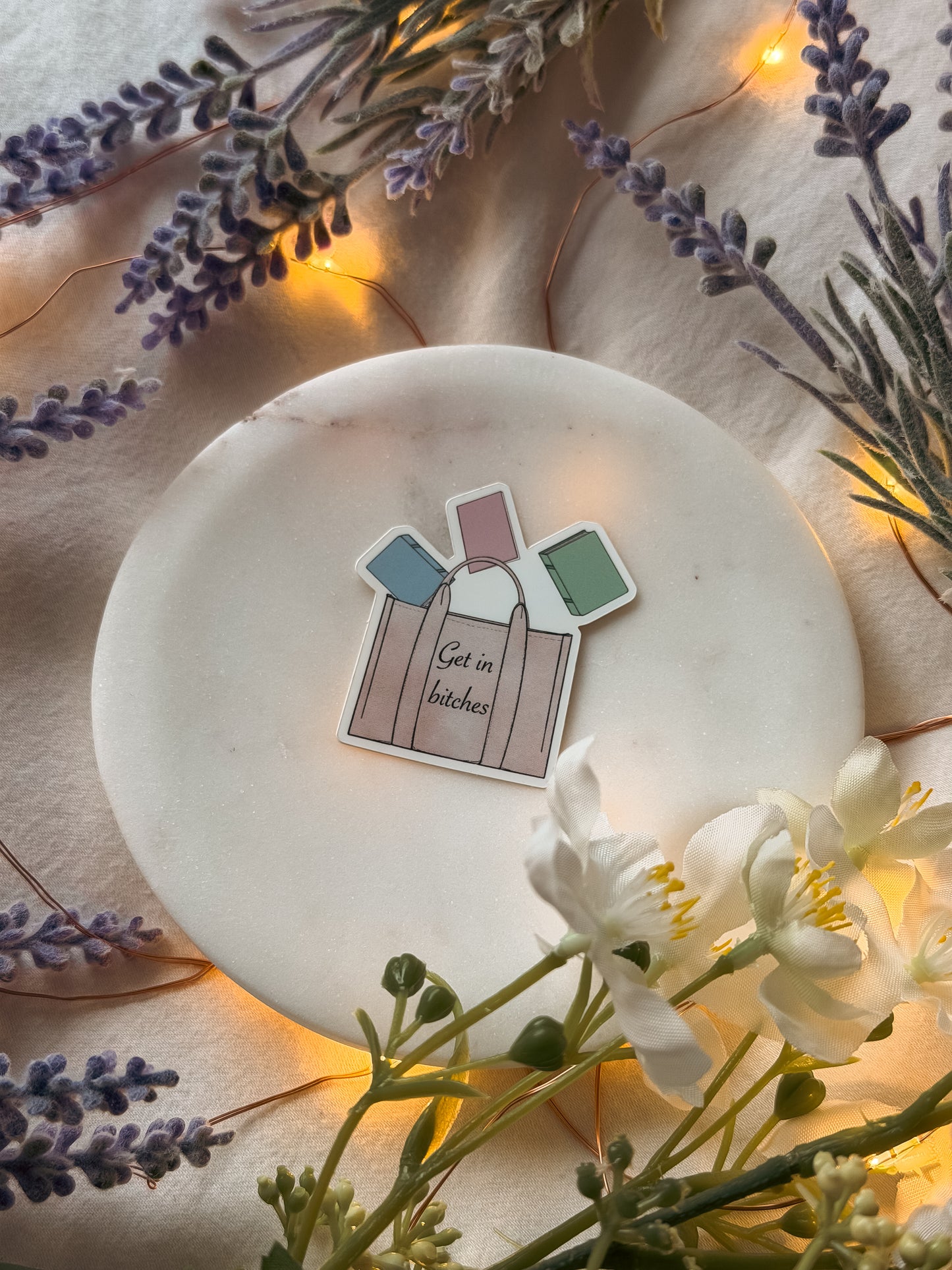 "Get in b**" tote with books vinyl sticker