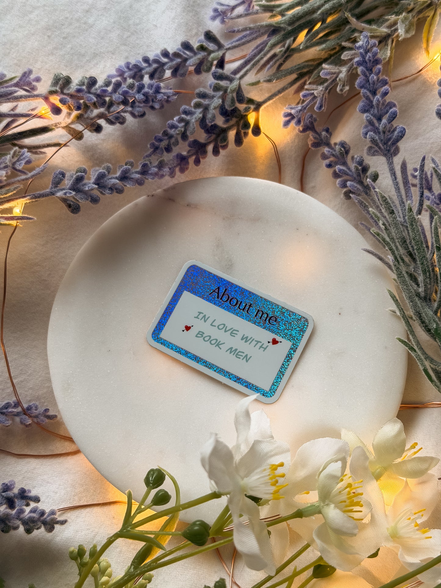 "In love with book men" name tag